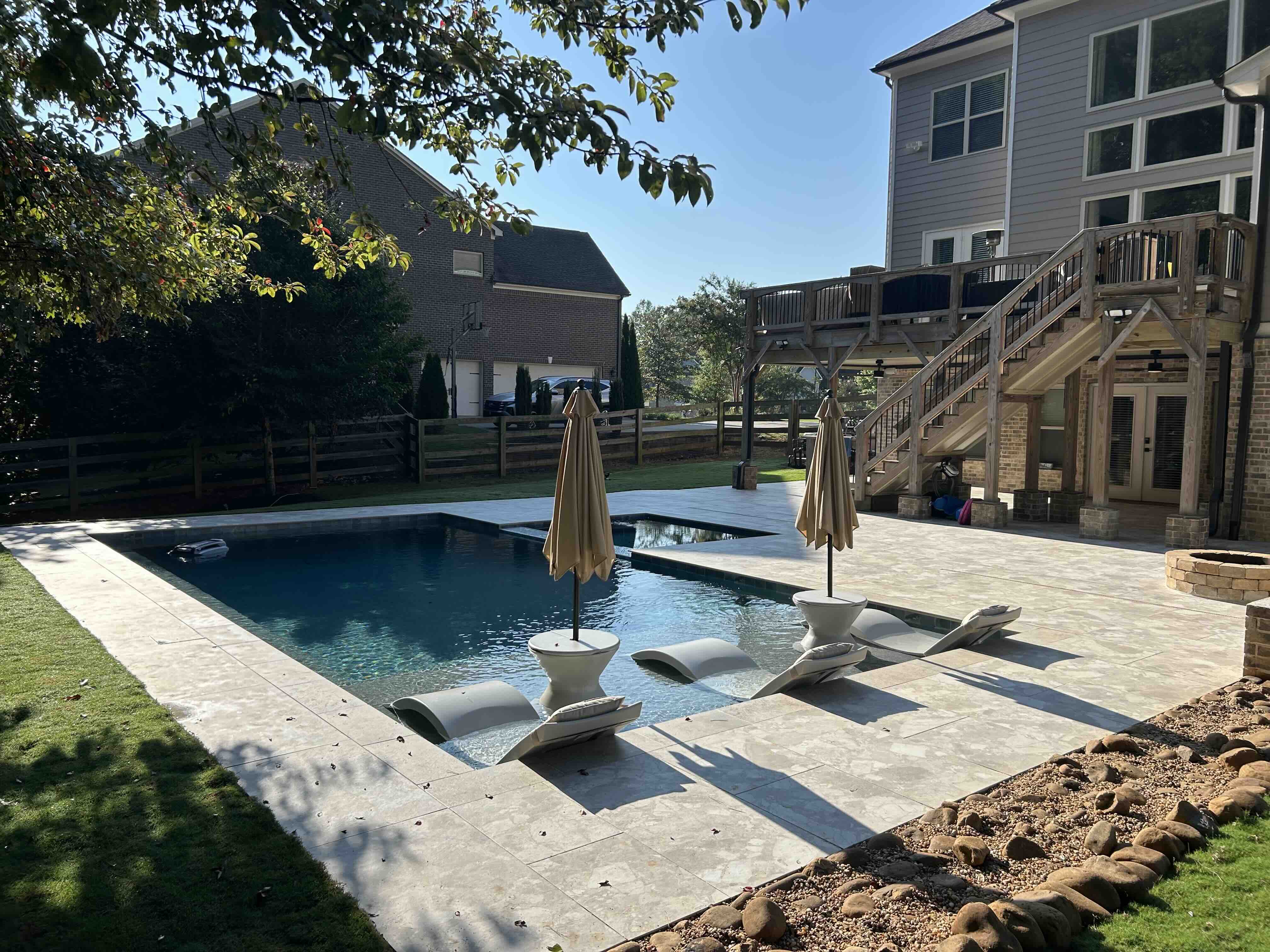 Gunite pool shell and retaining walls during a hillside pool construction in Metro Atlanta