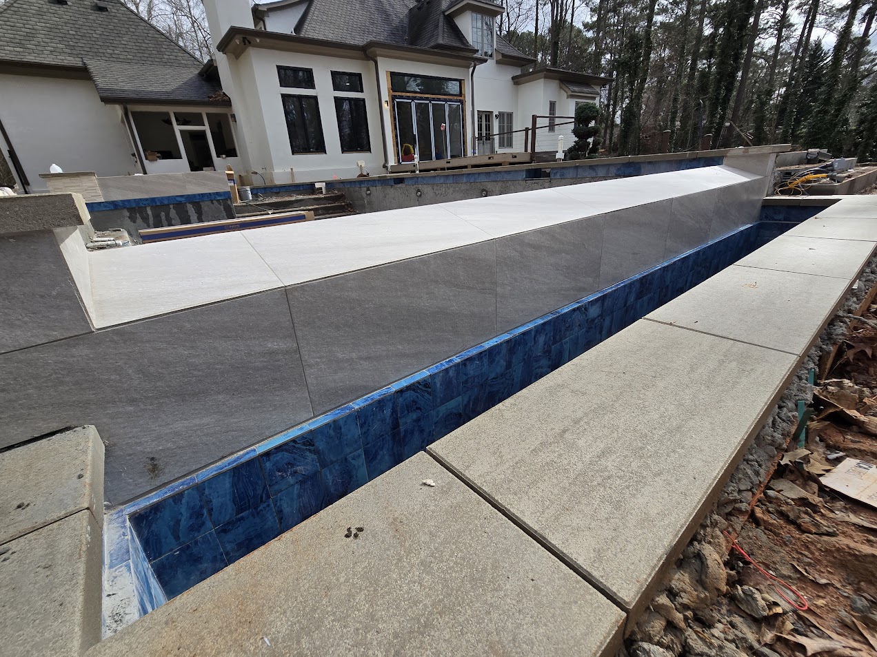 Coping and tile work on luxury shotcrete pool